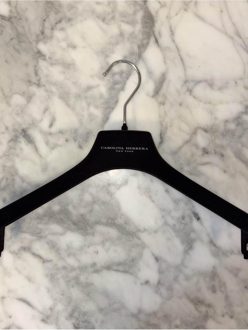Authentic Carolina Herrera black velvet luxury hanger